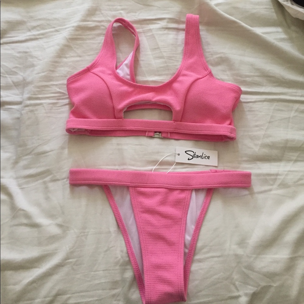 Never worn swimsuit- still has liner and tags